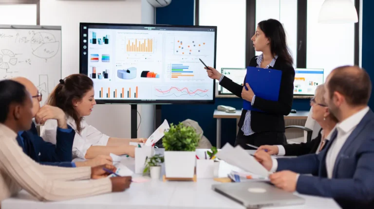 Removal business team reviewing job performance and operational data